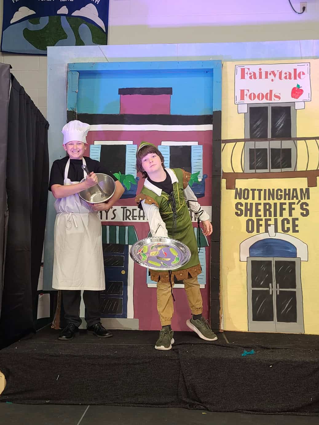 Children prepare for a school play at New Era Christian